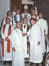 Priests past and present attend the 25th Anniversary Mass