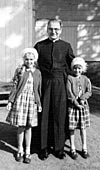 Fr. Chester and Newell girls